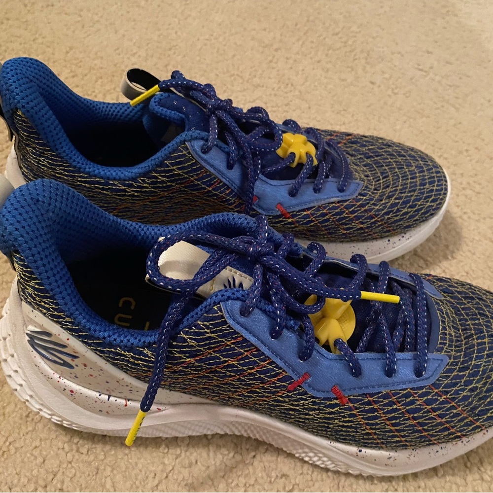 Under Armour. Curry 10 men’s basketball shoes.